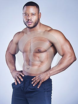 If you want serious results youve gotta take serious action. Studio shot of a handsome young man posing against a grey