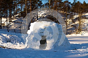 Igloo - house in the winter on the lake