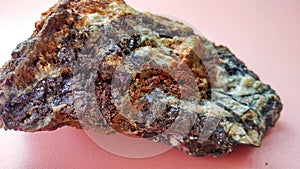 Andesite altered on hydrothermal alteration zone with pyrite and calcopyrite photo