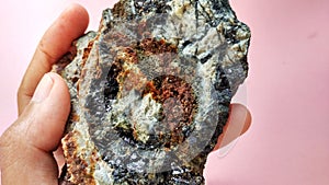 Andesite altered on hydrothermal alteration zone with pyrite and calcopyrite photo
