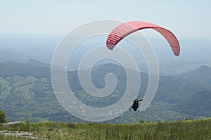 Paragliding as seen from the Ignis peak in Maramures photo