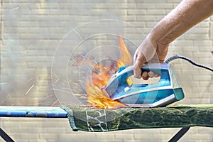 Ignition of an electric iron for ironing clothes
