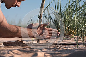 Ignition fire in the wild without matches and lighters. Survival in extreme conditions