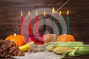 Ignition of Kwanzaa traditional candles, festival concept with g