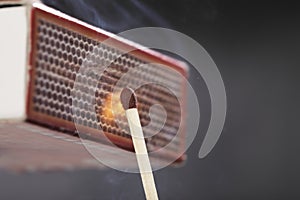 Ignition of a match photo