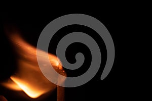 Ignition of match with sparks isolated on black background space for text fire concept passion figures variety