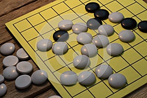 igo chinese board game with black and white stone