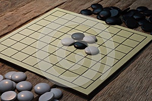 igo chinese board game with black and white stone