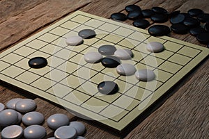 igo chinese board game with black and white stone