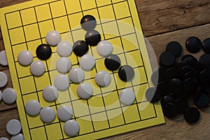 igo chinese board game with black and white stone