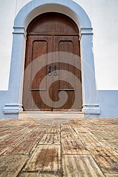 Igreja da Misericordia church doorway, in pretty blue and white colors in Aljezur Portugal, Algarve region photo