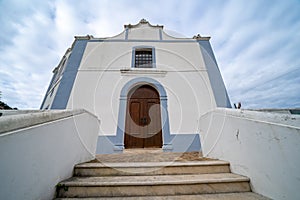 Igreja da Misericordia church, in pretty blue and white colors in Aljezur Portugal, Algarve region photo
