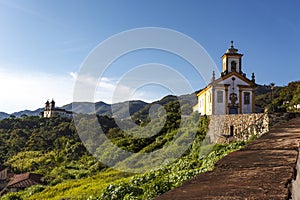 Igreja de Nossa Senhora das Merces e da Misericordia sits on a ridge overlooking the town Ouro Preto, Minas Gerais, Brazil, photo