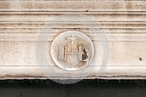 IHS Christogram carved in the stone of a building in Dubrovnik photo