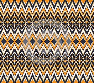 Ikat seamless pattern. Vector tie dye shibori print with stripes and chevron. Ink textured japanese background.