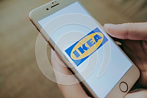 IKEA logo on the smartphone screen.