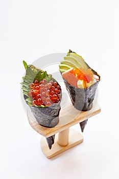 Ikura and Kani with Avocado, Tamago Yaki and Ebiko California or Temaki Sushi Hand Roll