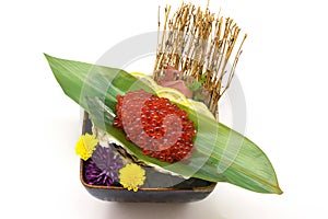 Ikura sashimi (Salmon roe) in black bowl Japanese style on white