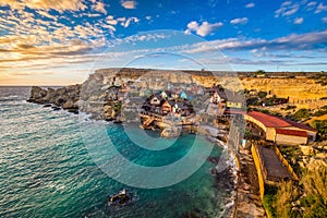 Il-Mellieha, Malta - Sunset at the famous Popeye Village at Anchor Bay