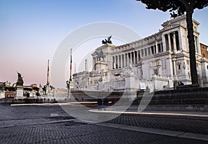 Il Vittoriano in Rome at dusk with light trails