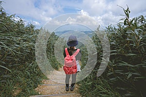 Ilan County, Taiwan - August 7th, 2020: A young female is walking on the famous Marian Hiking Trail, which is located above the