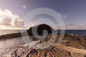 Ilheu de Rosto de Cao island in the morning, Sao Miguel island, Azores photo