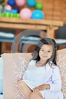 Ill be granting my own birthday wishes this year. Portrait of a cute little girl playing with a fairy wand at home.