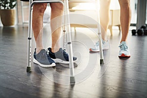 Ill be with you throughout the healing process. Closeup shot of a physiotherapist assisting a senior patient with a