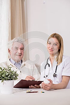 Ill man with private nurse