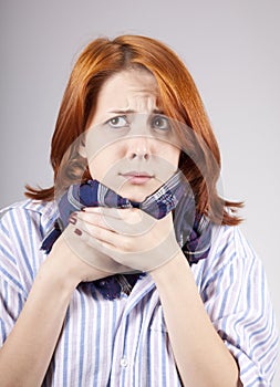 Ill red-haired girl with scarf