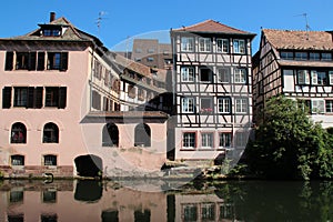 ill river and half-timbered habitation buildings at the \