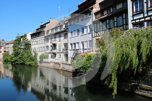 ill river and half-timbered habitation buildings at the \