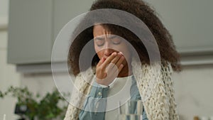 Ill sick unwell unhealthy sad suffering asthmatic African American woman female girl lady cough illness disease symptoms