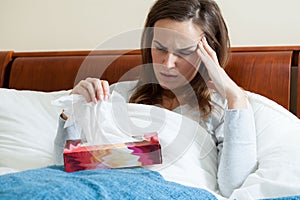 Ill woman feeling pain photo