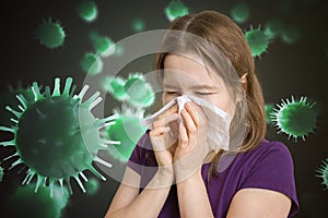 Ill woman has flu and is sneezing. Many viruses and germs flying around photo