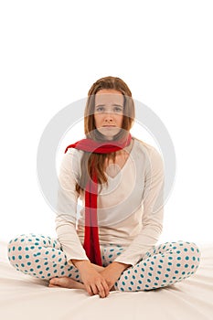 Ill woman rests in bed isolated over white background