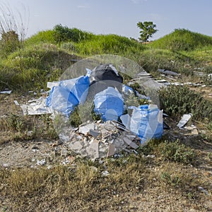 Illegal dumping and garbage in the field