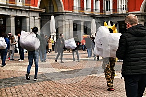 Illegal street vendors in La Plaza Mayor in Madrid