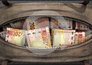 Illicit Cash In A Brown Duffel Bag