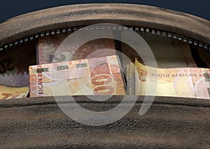 Illicit Cash In A Brown Duffel Bag