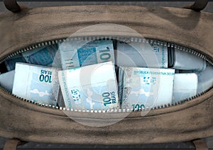 Illicit Cash In A Brown Duffel Bag