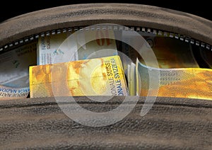 Illicit Cash In A Brown Duffel Bag