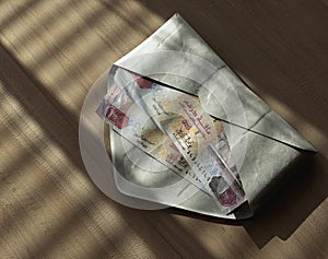 Illicit Dirham Banknotes In Envelope