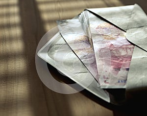 Illicit Yuan Banknotes In Envelope