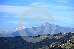 Illiniza and El CorazÃÂ³n volcano in a typical summer morning. photo