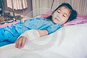 Illness asian child admitted in hospital with saline intravenous