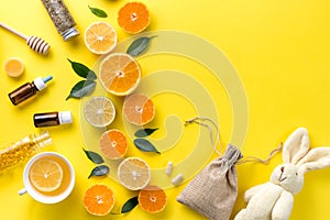 Illness concept. Composition alternative medicine. Herbal tea, ginger and lemon on a yellow background. Child`s health