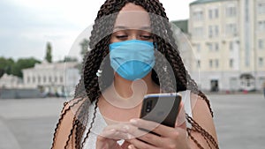 Illness prevention in protective face mask at city street