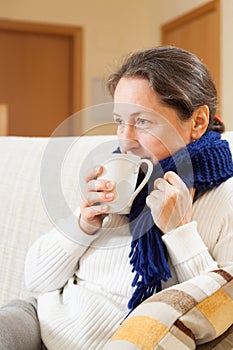 Illness woman drinking hot tea