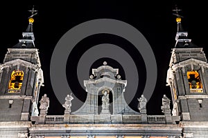 Illuminated Almudena Cathedral belfries in Madrid, Spain